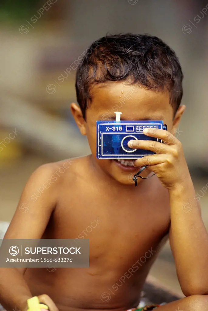 little boy with a facticious camera, Sumatra island, Republic of Indonesia, Southeast Asia and Oceania
