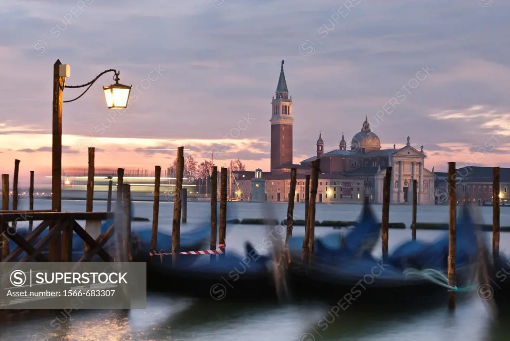 View of Lido island and gondolas at sunrise, Venice, Italy, Europe