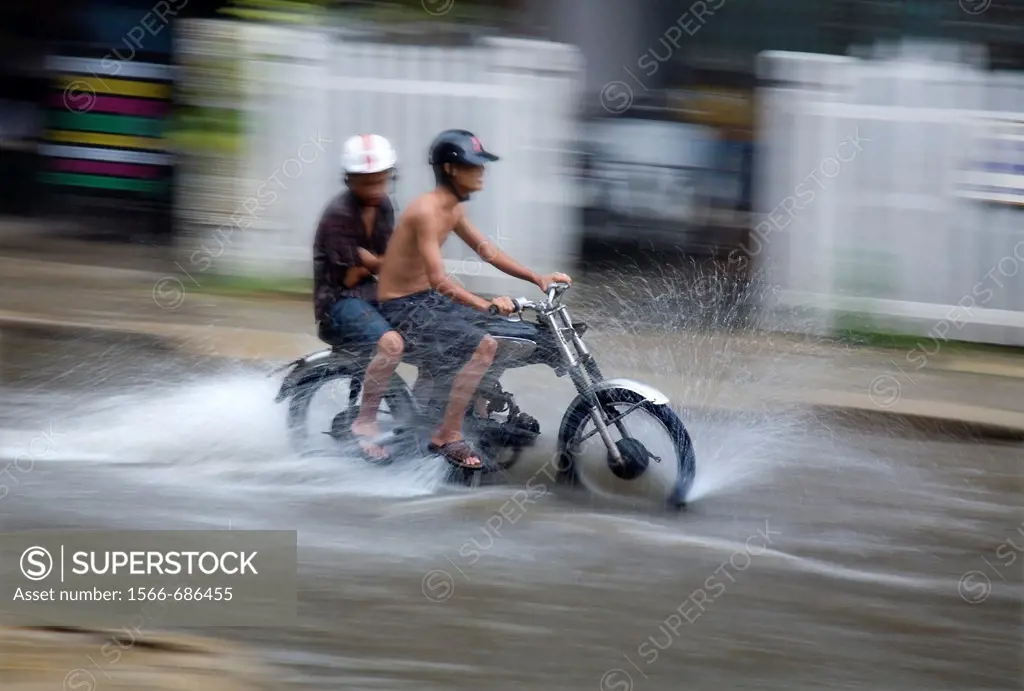 boys on a motorcycle  Hoi An, Vietnam, Asia