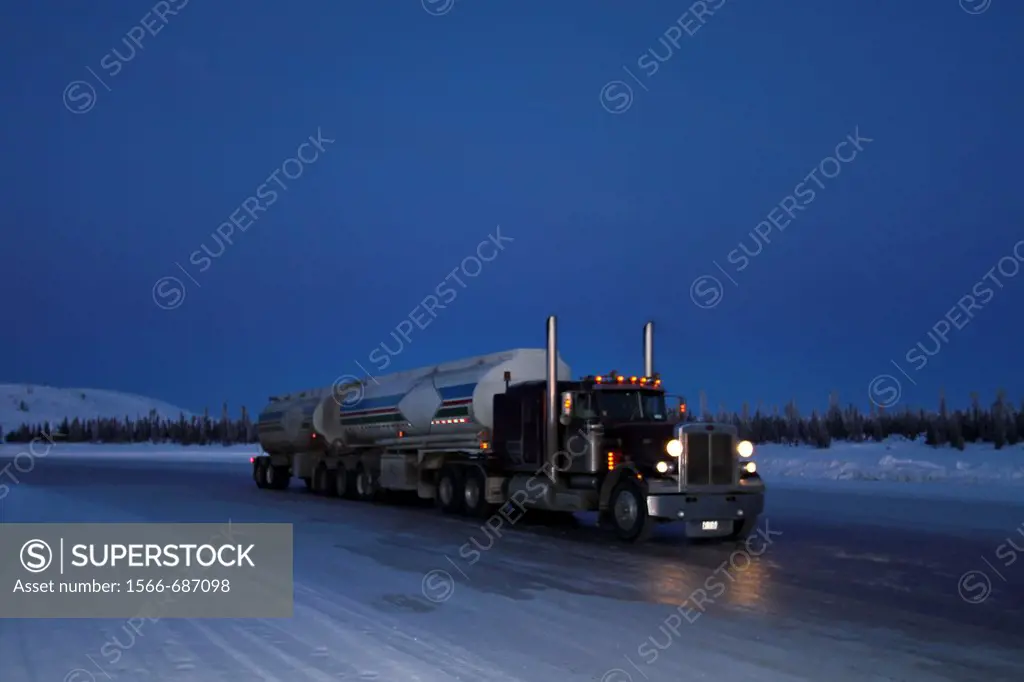 Heavy trucks on the ice road from Tibbitt to Contwoyto beginning just outside of Yellowknife, Northwest Territories, Canada  MORE INFO This seasonal i...