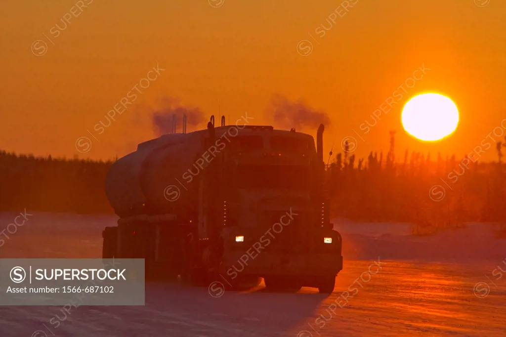 Heavy trucks on the ice road from Tibbitt to Contwoyto beginning just outside of Yellowknife, Northwest Territories, Canada  MORE INFO This seasonal i...