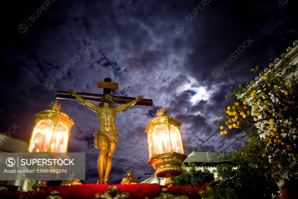Statue of the Christ of Good Death during a Holy Week procession in the town of Prado del Rey in Cadiz Province, Southern Spain. Easter processions in...
