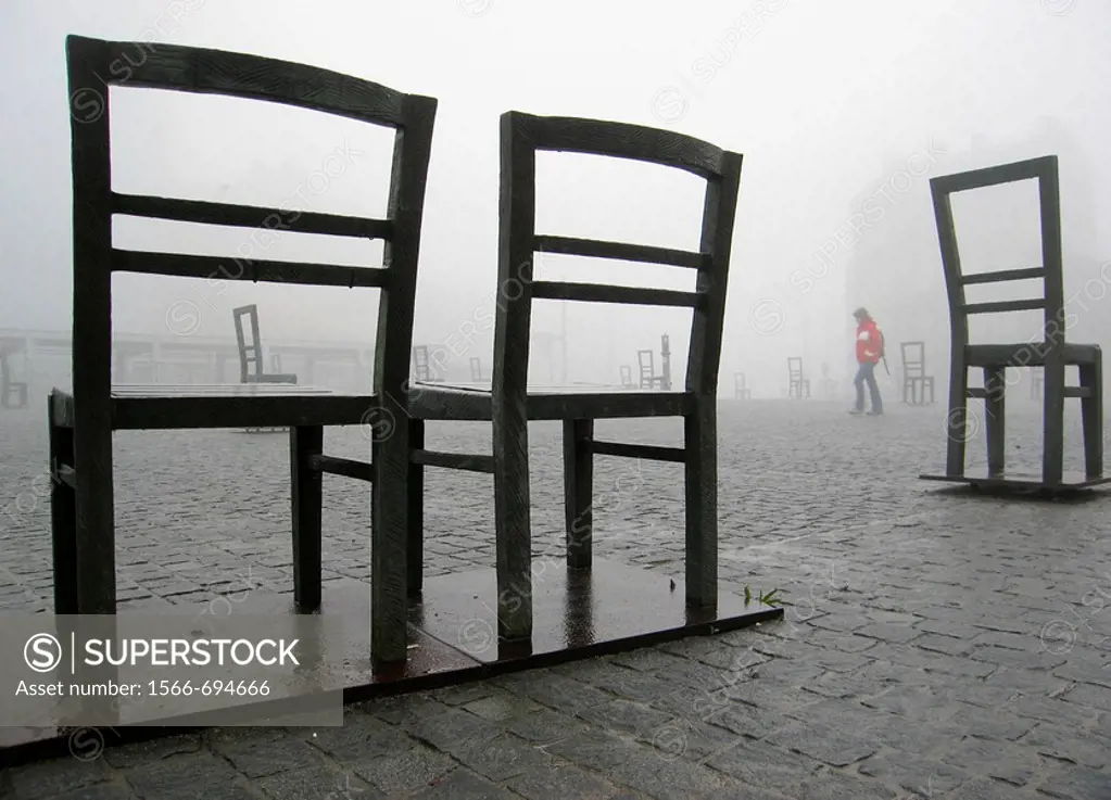 Poland, Krakow, Podgorze district, Memorial to the heroes of the Krakow ghetto, metal chairs