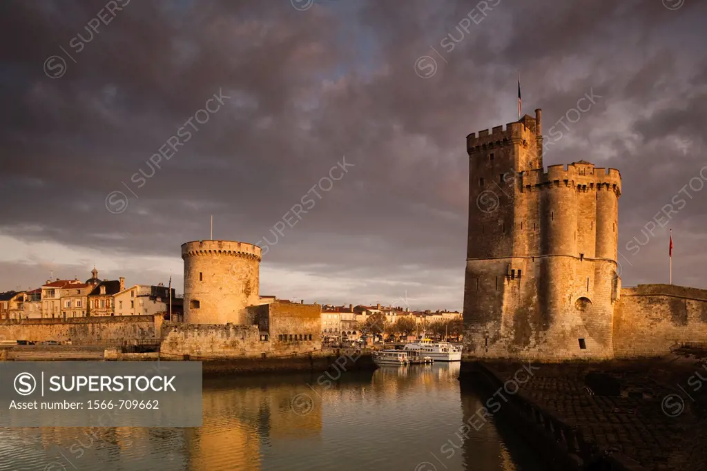 France, Poitou-Charentes Region, Charente-Maritime Department, La Rochelle,Old Port, Tour de la Chaine and Tour St-Nicholas towers, dawn
