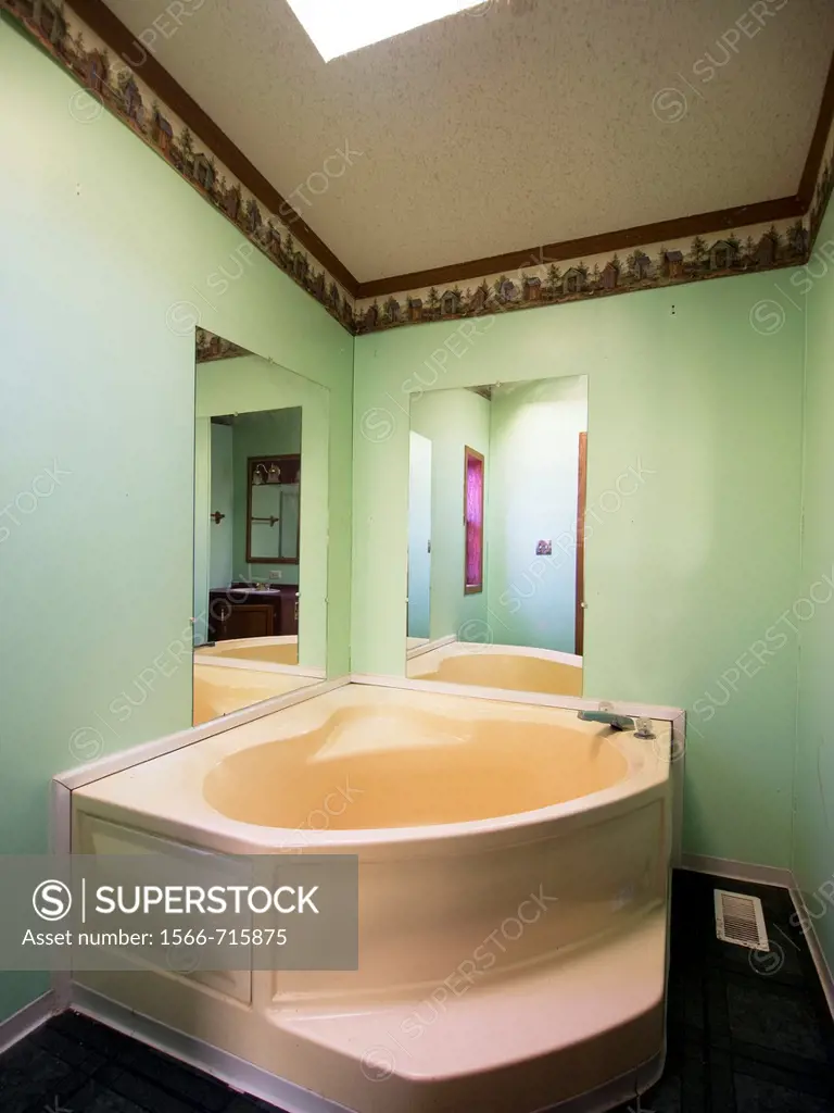 Hot tub in a foreclosed home in Interlochen, Michigan, United States
