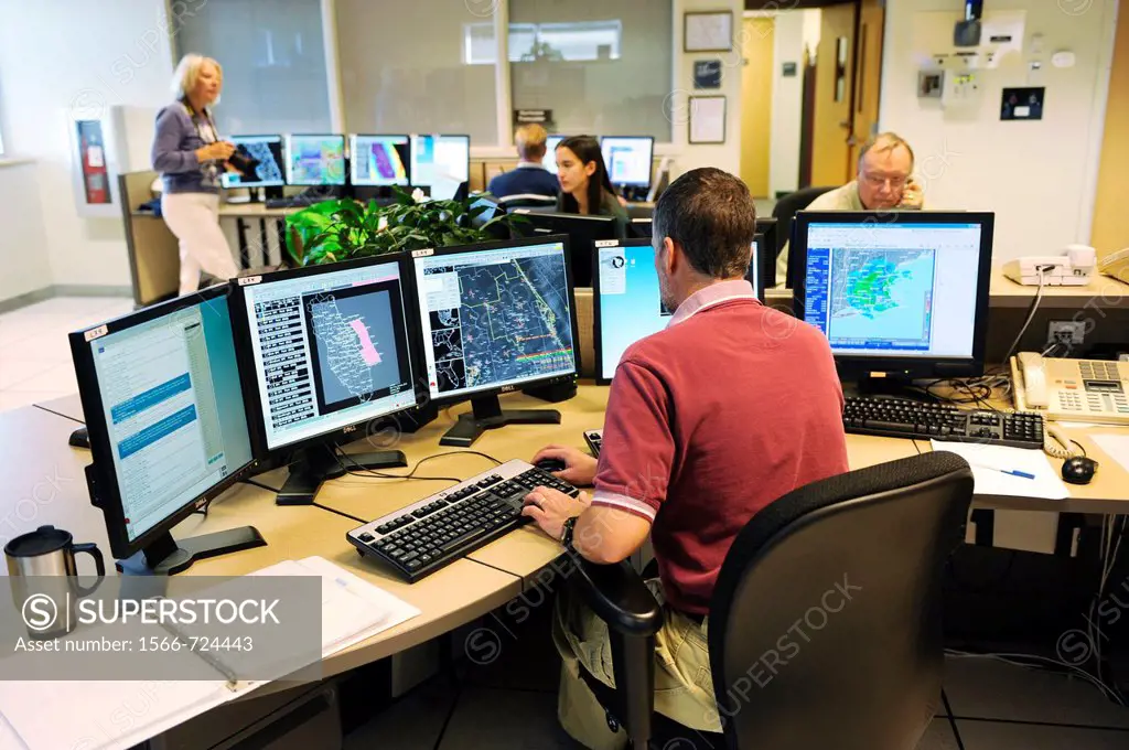 Meteorologist in Work Area in Doppler Radar National Oceanic and Atmospheric Administration NOAA National Weather Service Station Ruskin Florida Tampa...