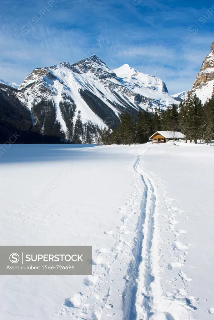 Backcountry ski track heading to warming shelter on Kinney Lake, Mount Robson Provincial Park British Columbia Canada