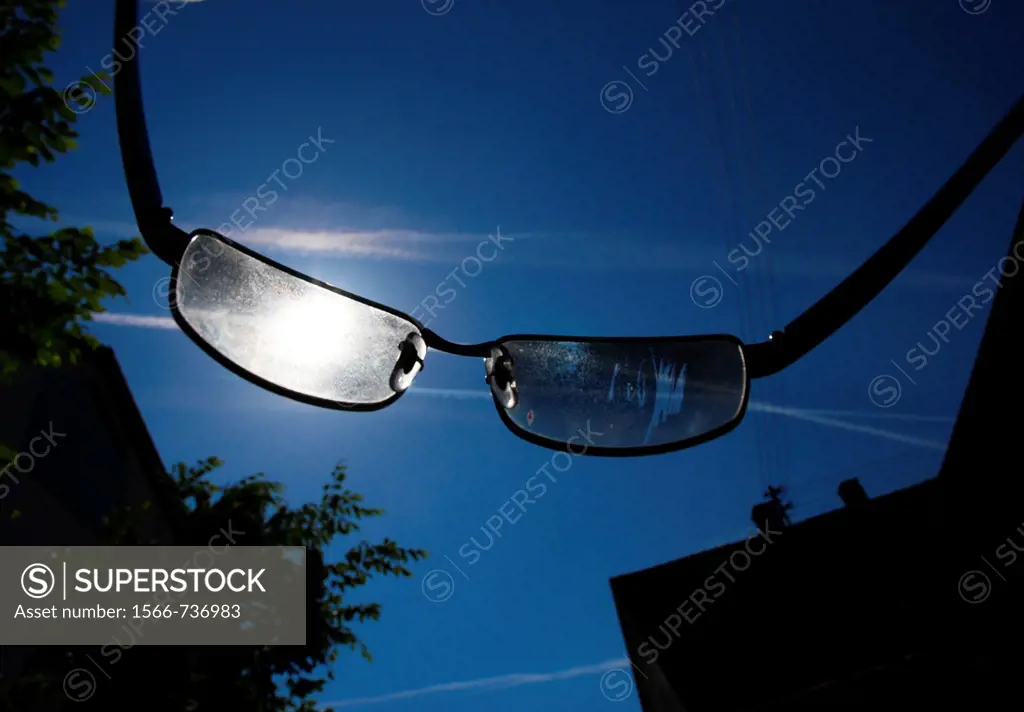 Looking through a pair of sunglasses in the sun