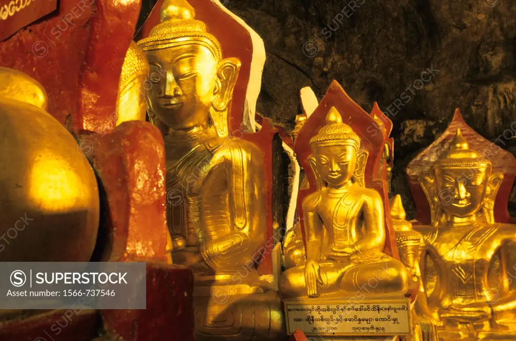 Golden Buddha statues in the Pindaya cave in Myanmar