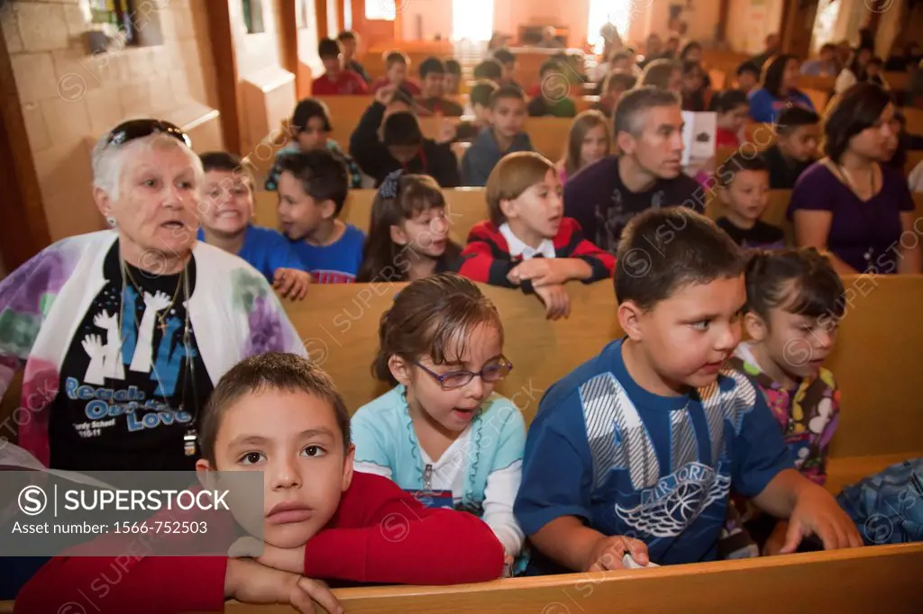 Española, New Mexico - Elementary school children in a chapel service at McCurdy School, a private school supported by the United Methodist Church