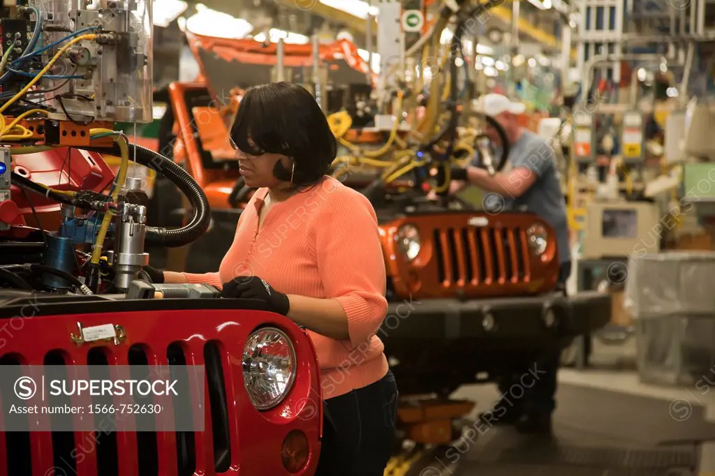 Toledo, Ohio - Workers assemble a Jeep at a Chrysler assembly plant