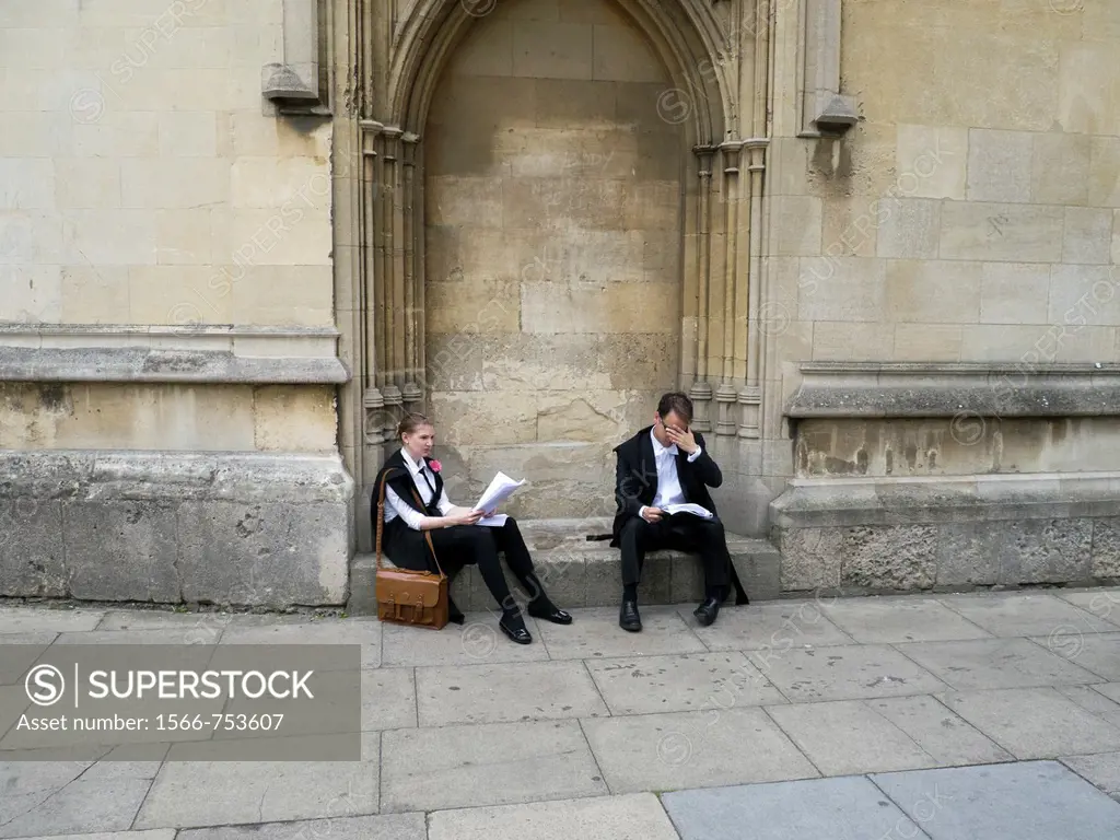 Students in Oxford dressed in morning suits with carnations in the button holes