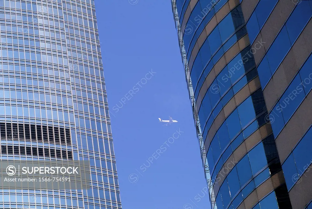 air-plane flying between skyscrapers, Hong-Kong Island, People´s Republic of China, Asia