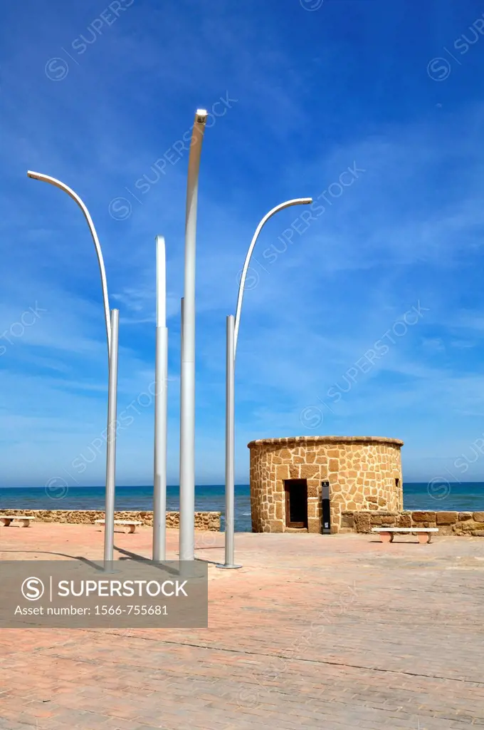 Torre De La Mata watchtower at Plaza Del Embarcadero in Torrevieja, Alicante, Spain