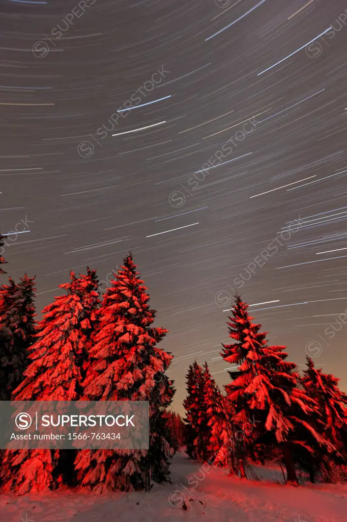 Star tracks in winter sky, Hohen Meissner National Park, North Hessen, Germany