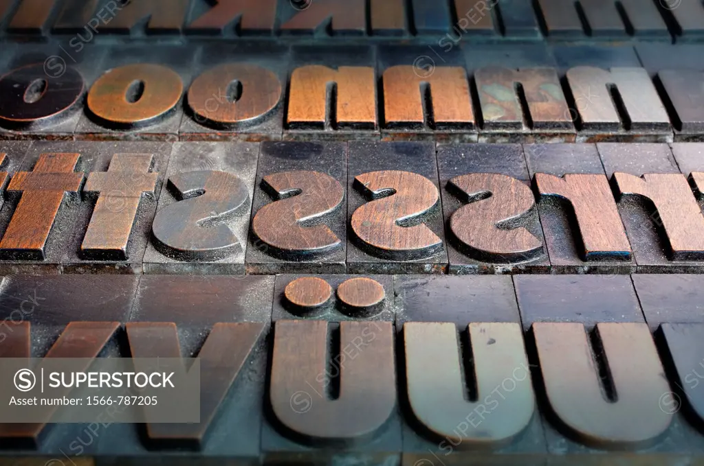 Old wooden letters for a letterpress printing press, type case with a bold poster font