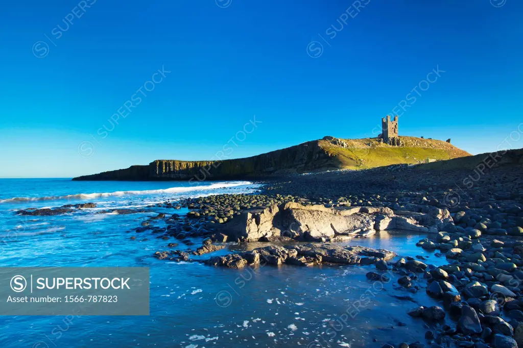England, Northumberland, Embleton Bay  The Lilburn Tower, part of the remains of Dunstanburgh Castle, viewed from Embleton Bay