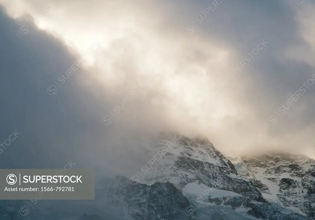 stormclouds forming over mountain in swiss alps