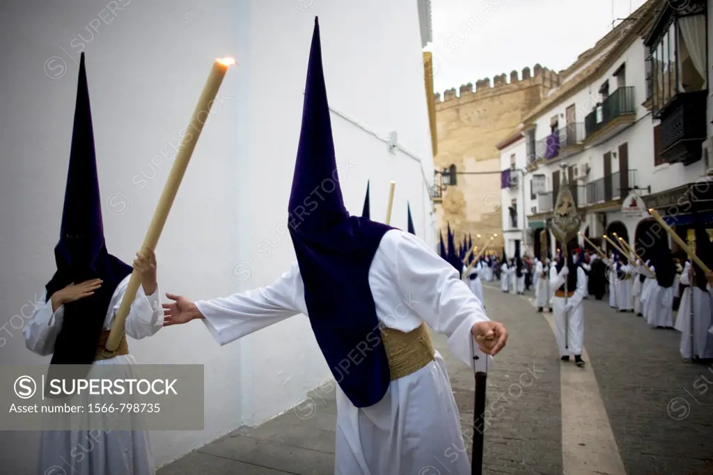 Penitents perform in an Easter Holy Week procession in Carmona village, Seville province, Andalusia, Spain, April 19, 2011