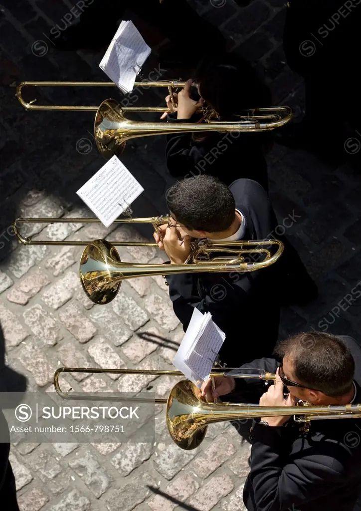 Members of music band performs in an Easter Holy Week procession in Cordoba, Andalusia, Spain, April 17, 2011