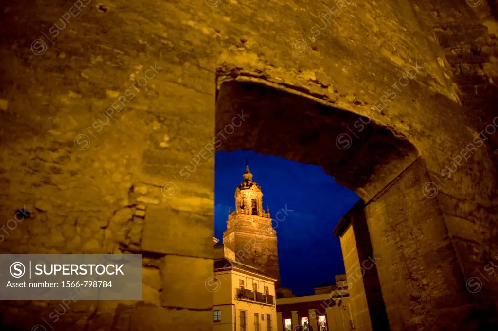 The San Bartolome church is seen through a door of the Alcazar fortress in Carmona, Seville province, Andalusia, Spain, April 20, 2011