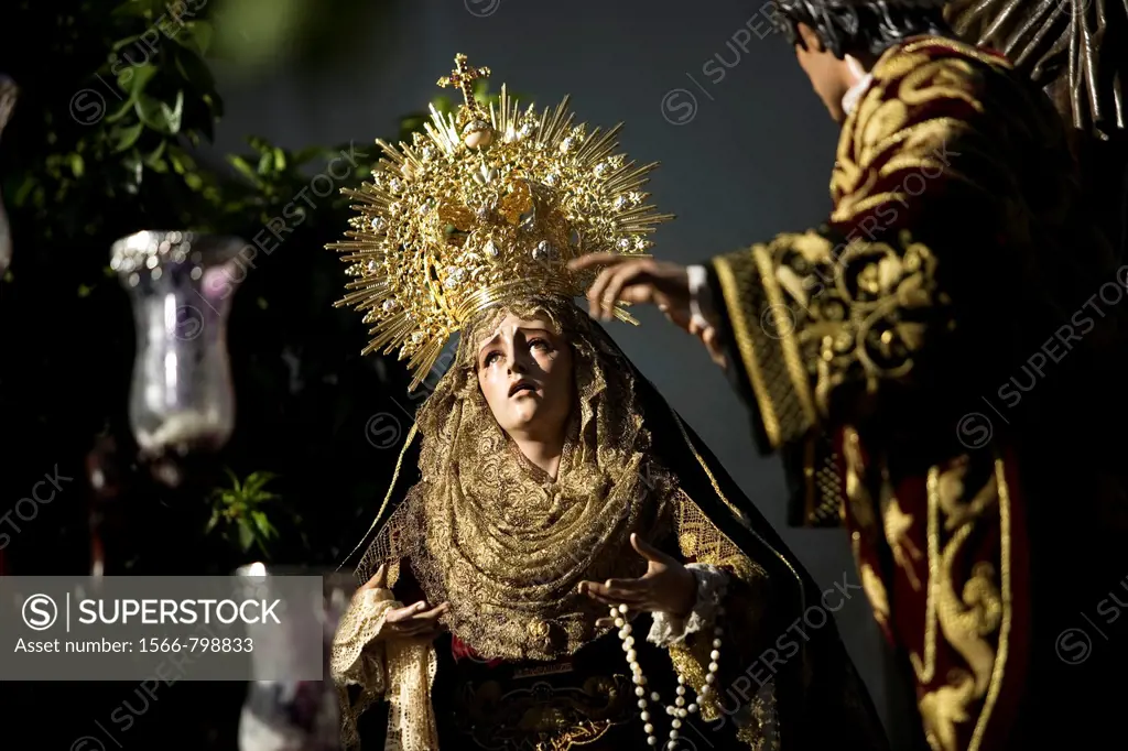 The image of Nuestra Señora de los Desamparados virgin is displayed by the Penas de Santiago brotherhood during an Easter Holy Week procession in Cord...