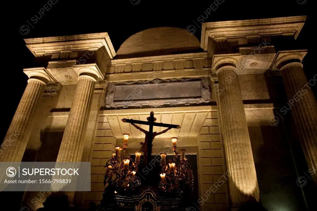 The Cristo del Amor sculpture crosses the Gate of the Roman Bridge, also known as the Arch of the Triumph during an Easter Holy Week procession in Cor...