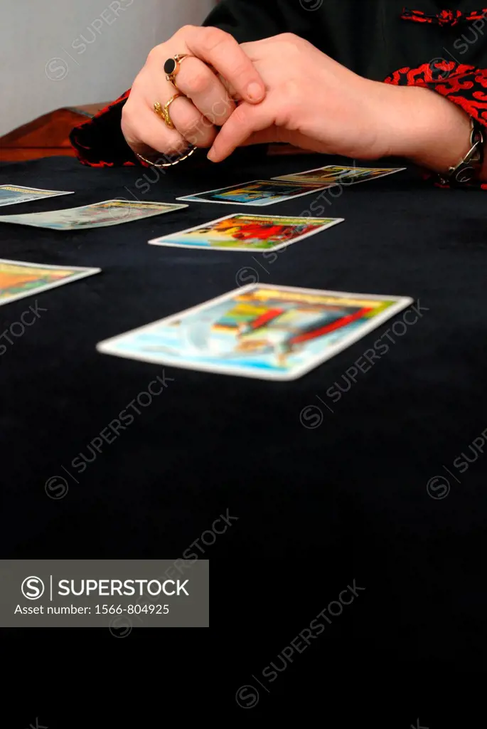 Fortune teller reading the tarot cards