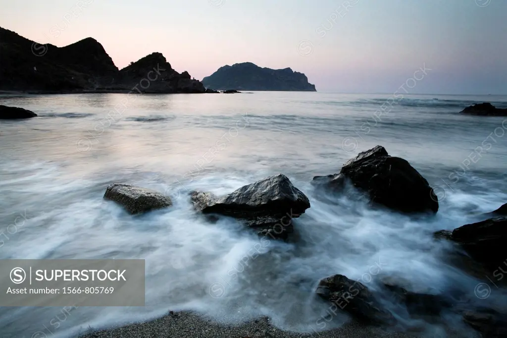View from west to east at dawn the ´head of Cope´ from a beach near the Barranco de la Mar, Cabo Cope, Murcia, Spain