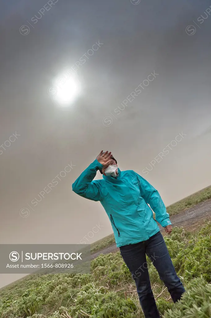 Grimsvotn Volcanic Eruption in the Vatnajokull Glacier, Iceland Woman wipes the ash from her eyes   May 21, 2011 eruption began spewing tons of ash, i...