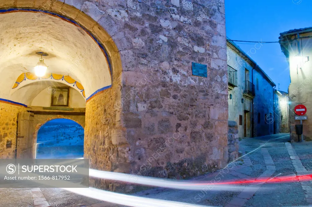 Arch and street, night view. Pedraza, Segovia province, Castilla León, Spain.