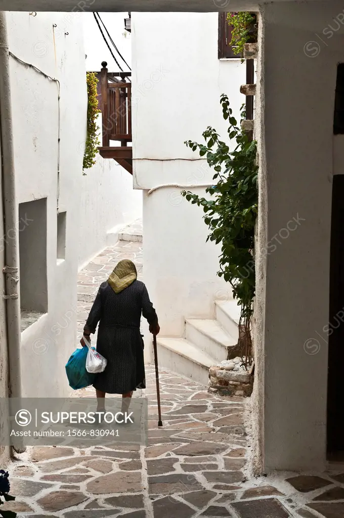 Narrow whitwashed allyway in the Old town of Naxos, Naxos island, Cyclades, Greece