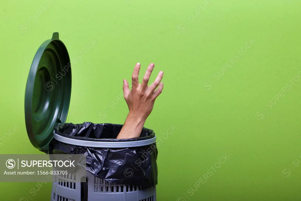 Hand outside bin