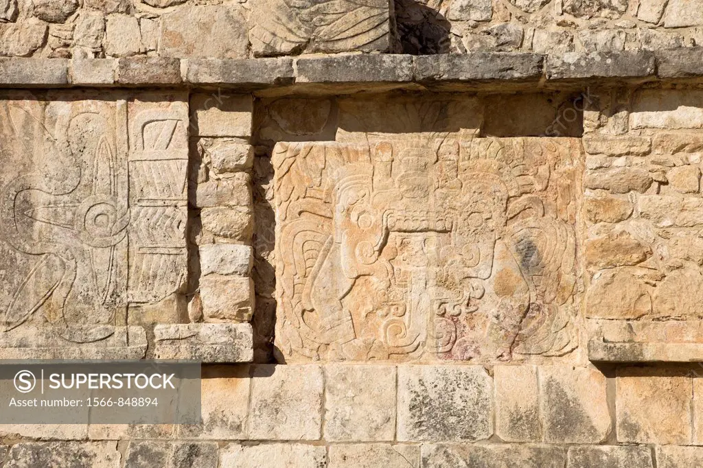 Stone relief of Quetzalcoatl-Kukulkan as the ´Morning Star´ on the side panel of the Venus Platform in Chichen Itza, Mexco