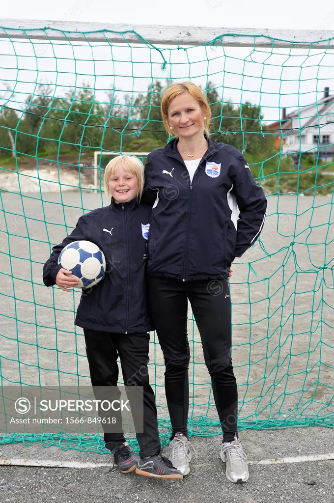 young female football players, Rebecca and her mother, Tromso County of Troms, Norway, Northern Europe