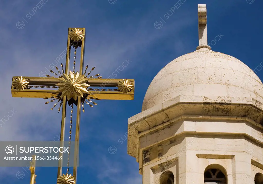 Cross in front of the Church of the Holy Sepulchre, Old City, UNESCO World Heritage Site, Jerusalem, Israel.
