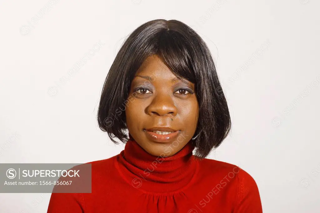 Studio shot of black woman, looking at camera