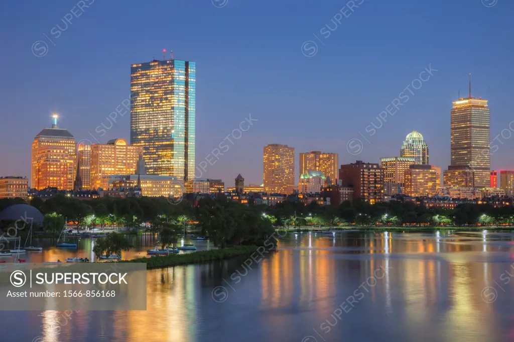 Twilight view of the Boston skyline including the John Hancock building and Prudential Center, as seen over the Charles River from the Longfellow Brid...