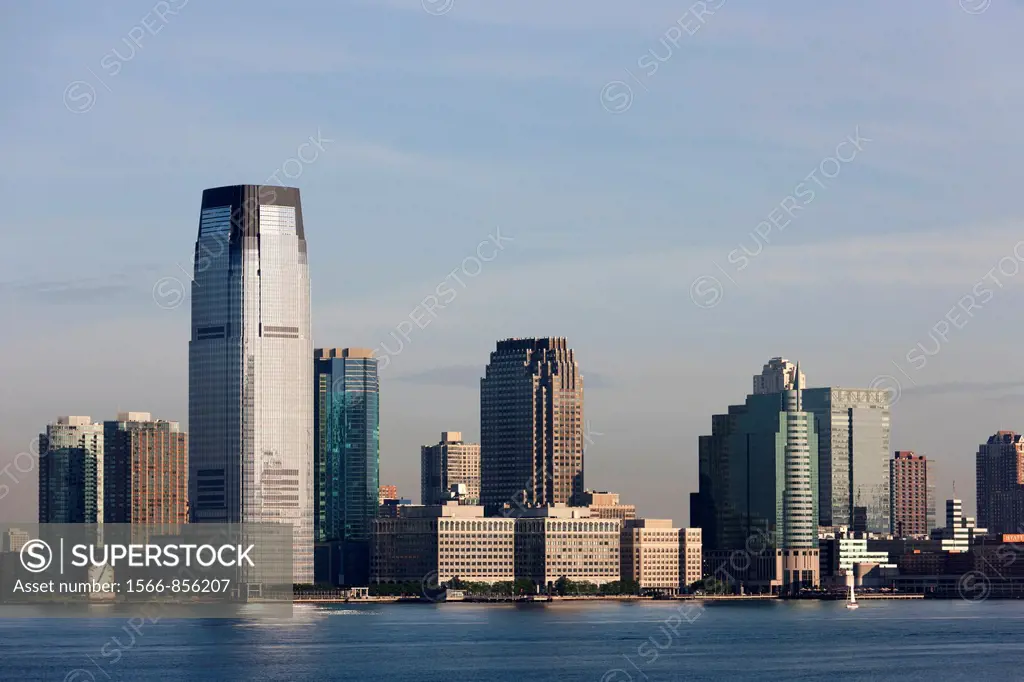 The Goldman Sachs Tower and Colgate-Palmolive clock along with other buildings overlooking the Hudson River in Jersey City, New Jersey, USA
