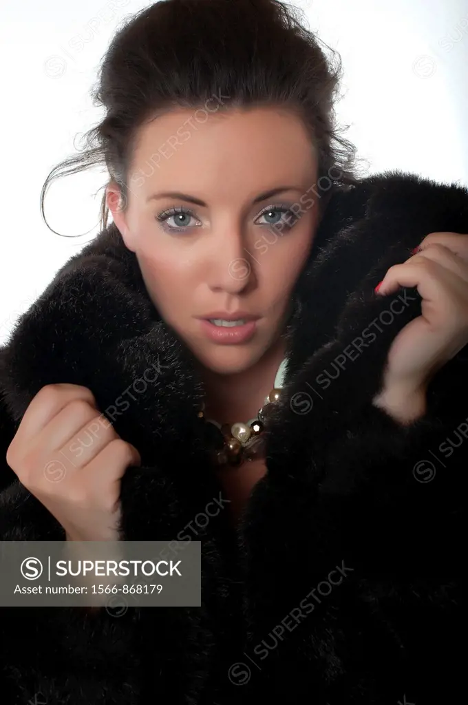 Beautiful woman in fur coat