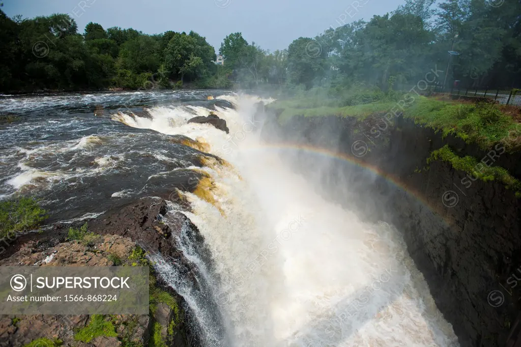 Thousands of gallons of water cascade over the Great Falls of the Passaic River in Paterson, NJ, seen on Saturday, September 3, 2011  Many communities...