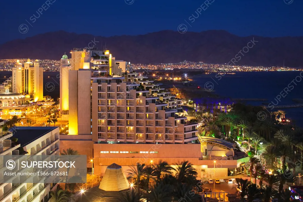 Israel, The Negev, Eilat, Red Sea beachfront, elevated resort view, evening
