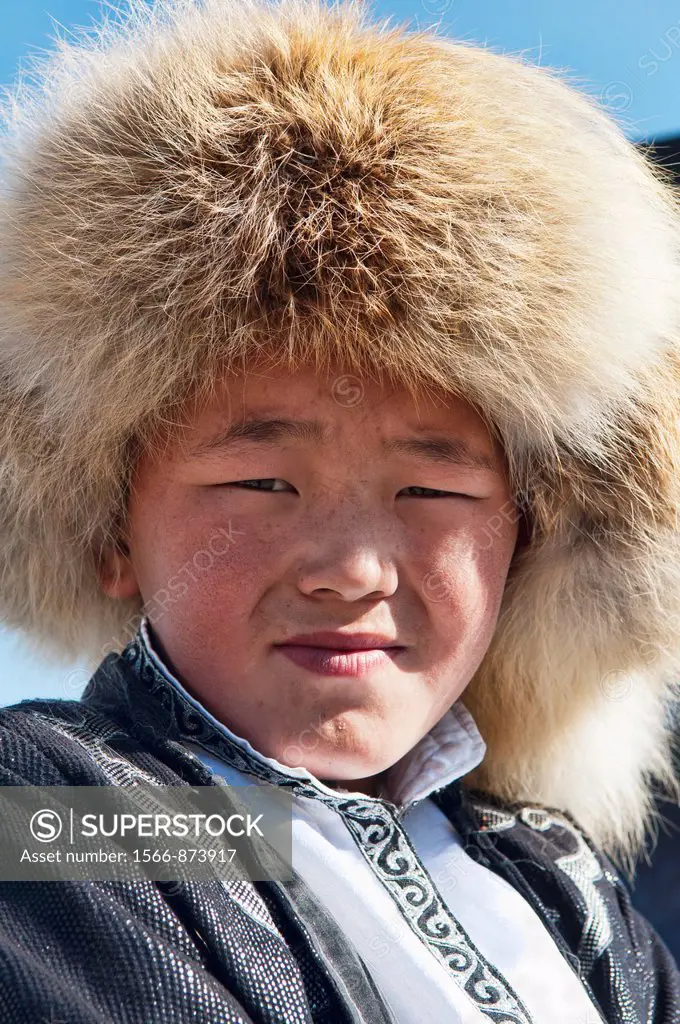 portrait of a Kazakh boy in the Altai Region of Bayan-Ölgii in Western Mongolia