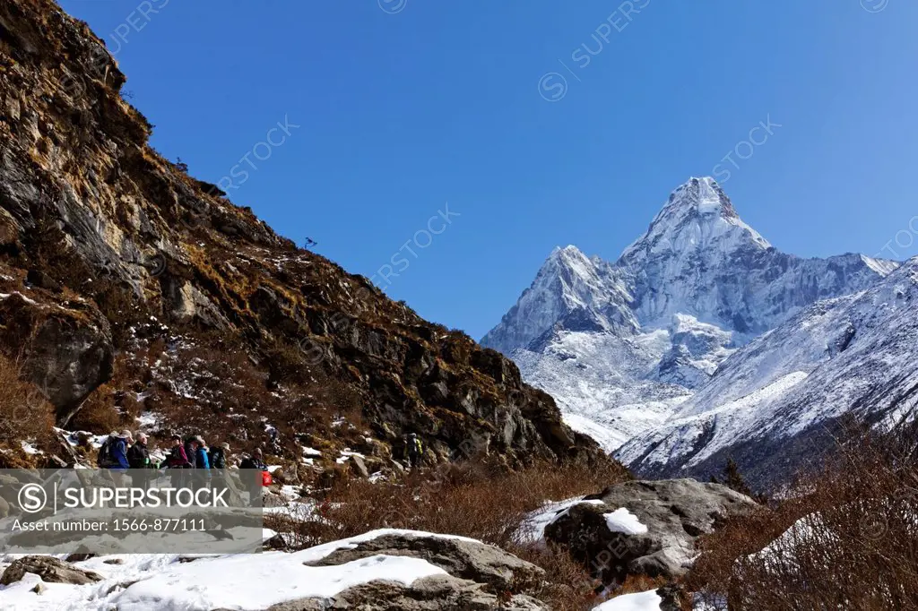 Trekkers and Ama Dablam mountain, Everest Region, Nepal