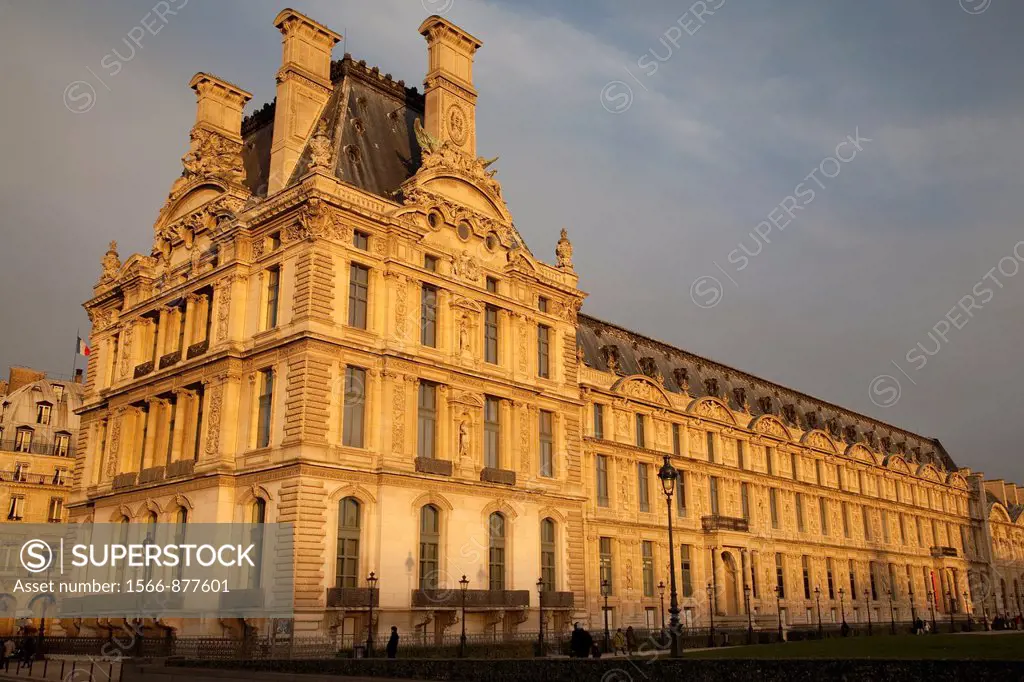 Facade of the Louvre Art Museum in Winter Evening Light in Paris, France