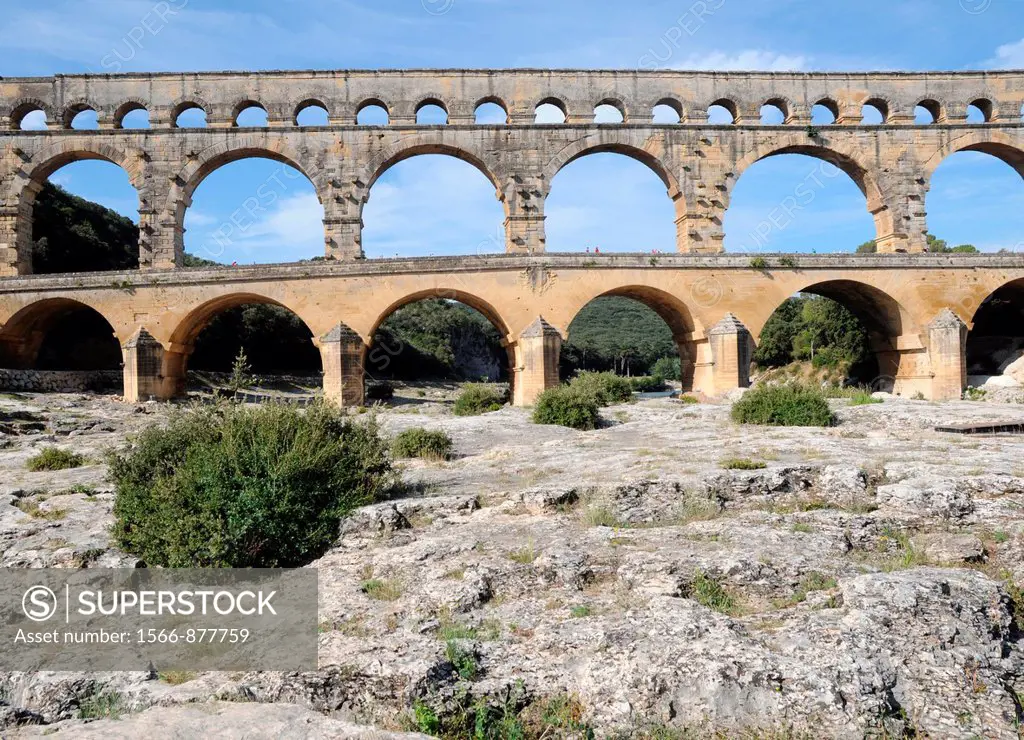 Ancient Roman aqueduct bridge from 1st century AD called Pont du Gard over Gard River near Remoulins, Gard departement in France
