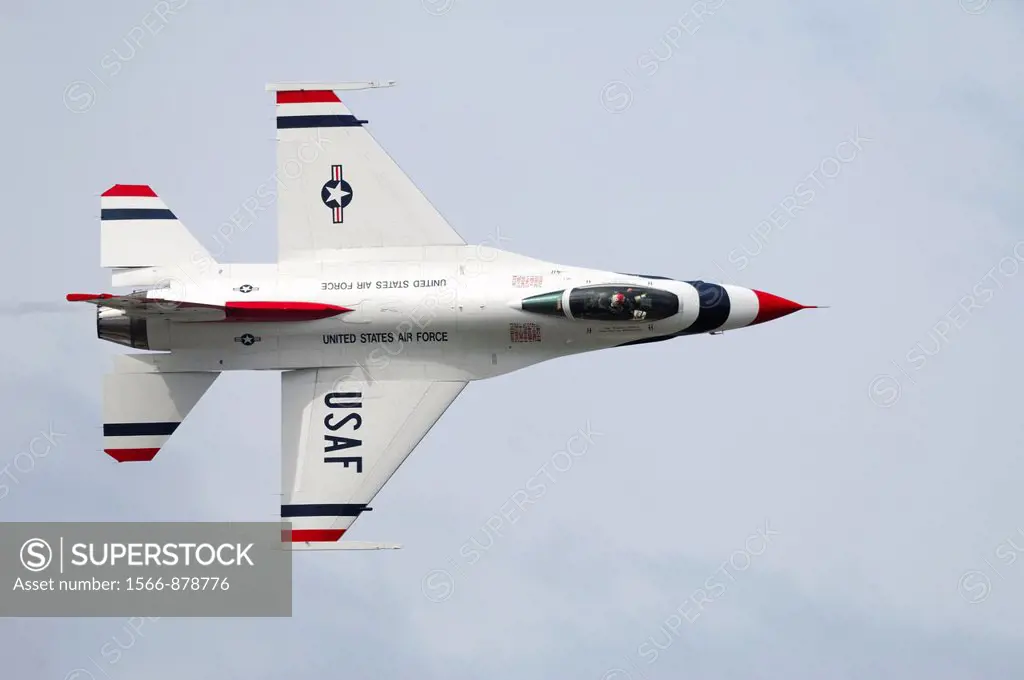 Solo F-16 jet fighter of the american aerobatic team Thunderbirds in flight at Elmendorf Air Force Base, Alaska, Usa