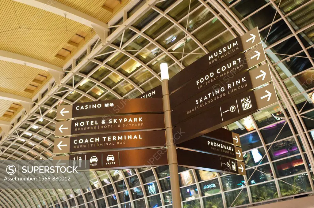 Direction signs in english and chinese at The Shoppe, the luxury shopping mall belonging to Marina Bay Sands Complex  Singapore