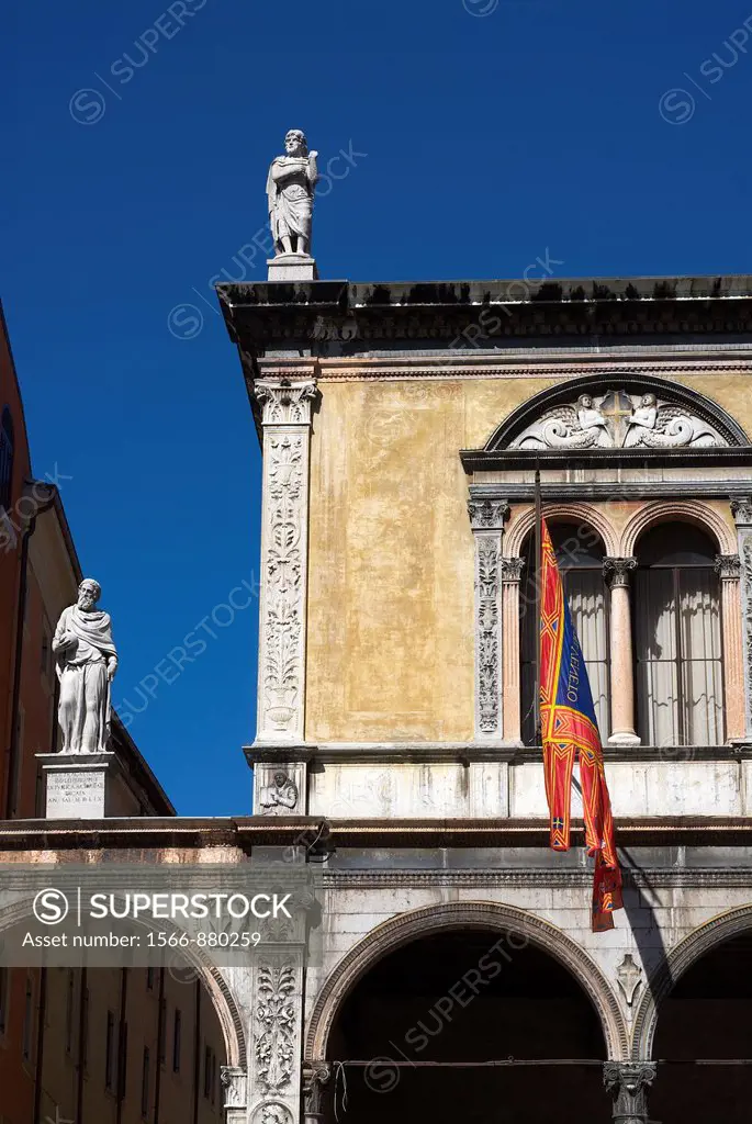 windows, arches and statues in Piazza dei Signori, Verona, Italy