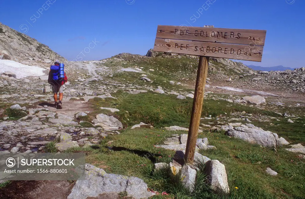 hiker in `Port de Ratera´ Ratera pass,Aigüestortes i Estany de Sant Maurici National Park,Pyrenees, Lleida province, Catalonia, Spain